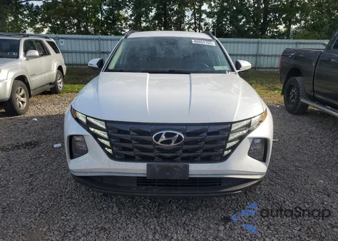 2022 Hyundai Tucson Blue z USA, uszkodzony, nr VIN KM8JBCA11NU066804